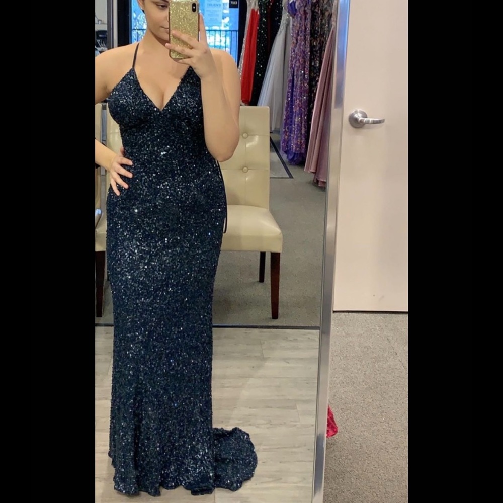 Brand new Scala prom dress never worn before in perfect condition.